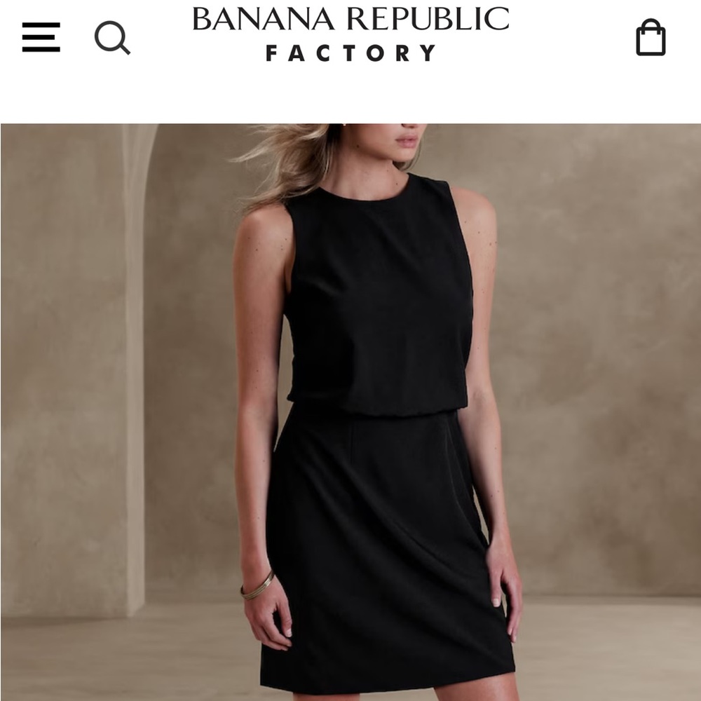 Black sculpted stretch bloussant dress.